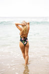 Fire Kai Hawaiian One Piece Swimsuit Back View on Model At Beach